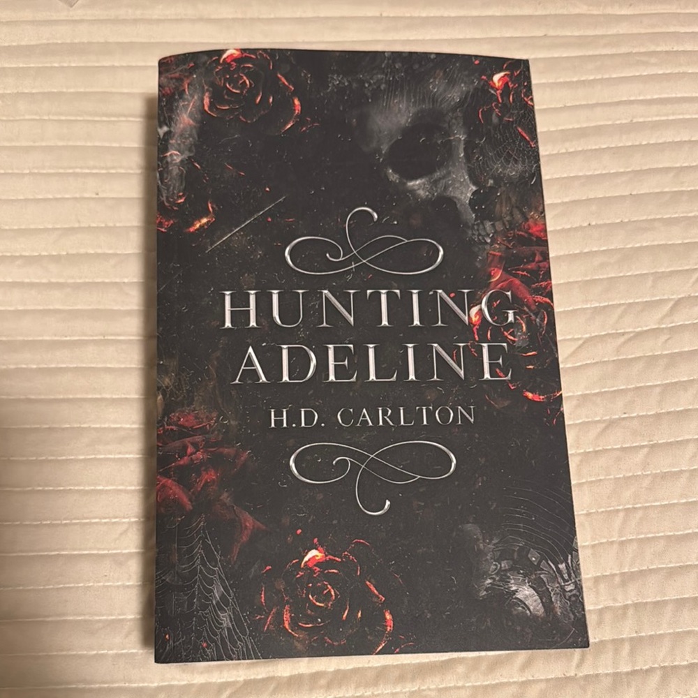Haunting Adeline
by H. D. Carlton